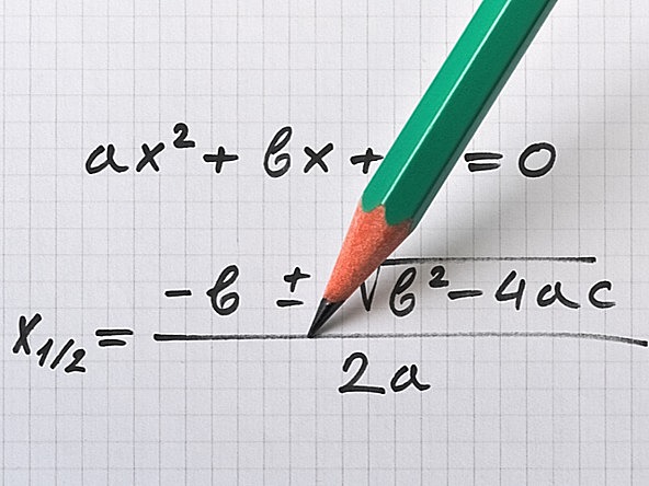quadratic equation on graph paper with pencil